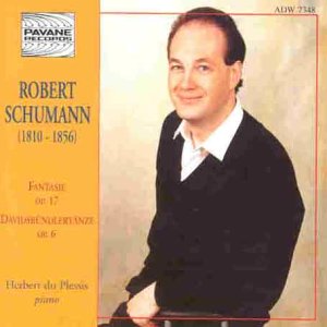 CD cover with a man in a black sweater on a yellow background.