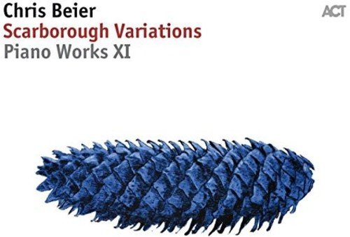 A white album cover with a blue, spiky, abstract shape and text.