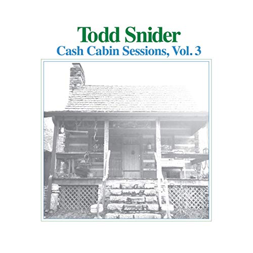 "Black and white image of a log cabin on a vinyl record cover."