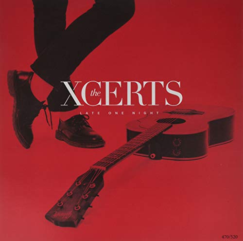 "Red album cover with a guitar and a person's legs jumping."