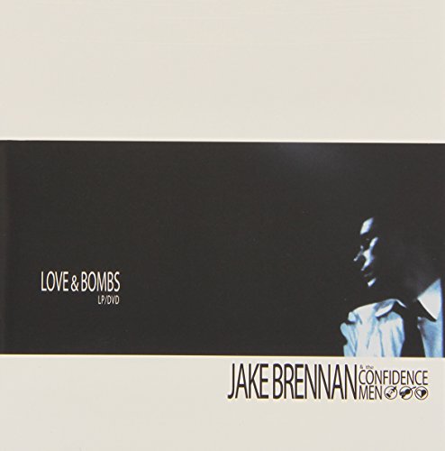 "CD cover with black banner, white text 'Love & Bombs' and a man's portrait."