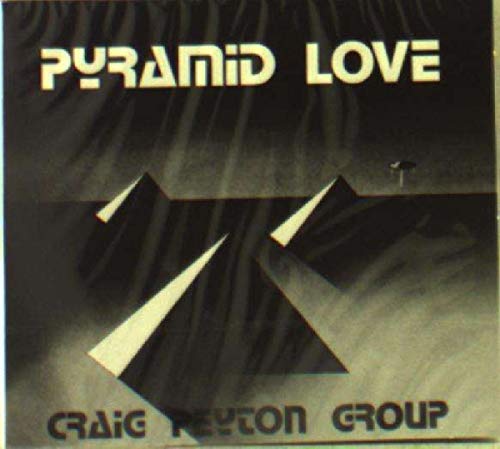 "Album cover with three pyramids and 'Pyramid Love' text in a desert landscape."