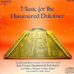 "CD cover featuring a hammered dulcimer on an orange gradient background with title text."