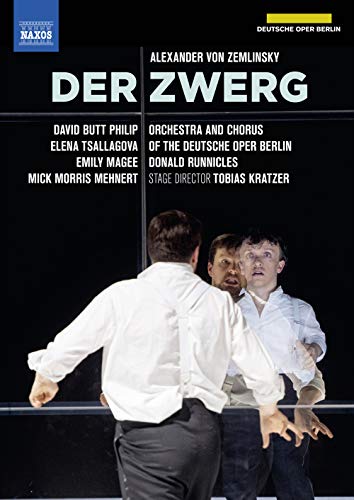 DVD cover for "Der Zwerg" with three men in white shirts against a black background.