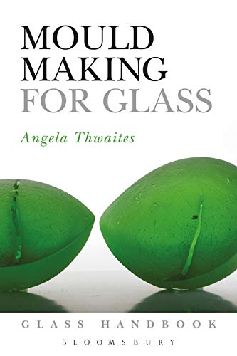 The image depicts a book cover with a white background and two green glass objects.
