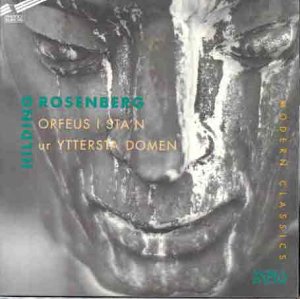 A grayscale stone face with text overlay on a CD album cover.