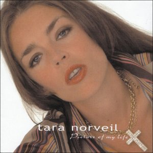Tara Norveil's album cover: close-up of a woman with brown hair and striped shirt.