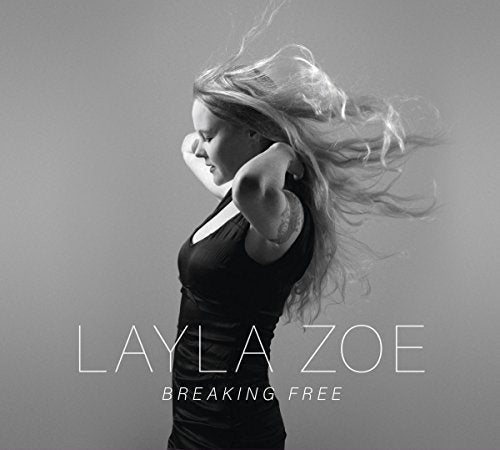 Black and white image of a woman with flowing hair, album cover artwork.