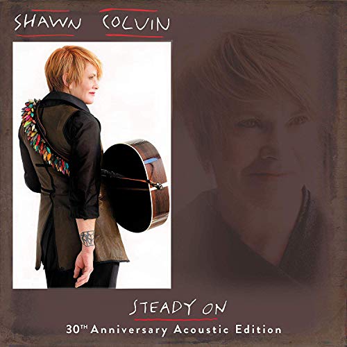 "Album cover featuring Shawn Colvin holding a guitar, with her name and album title."