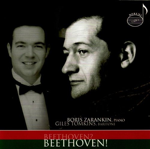 "CD cover with black and white image of two men, red and green border."