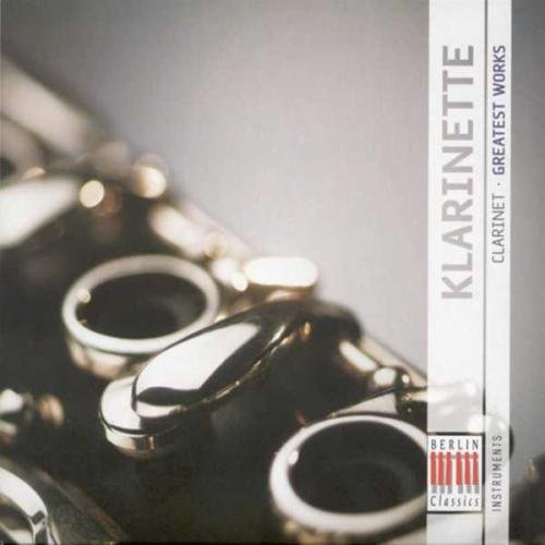 A close-up of a clarinet on a gray background with a white banner.