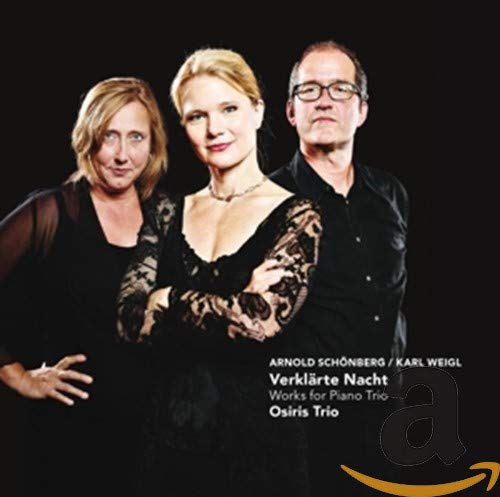 "CD cover featuring three musicians in black against a dark background."
