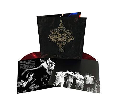Red vinyl record with black sleeve and gold logo, featuring a black-and-white concert image.