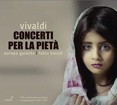 A young girl with blue eyes and a headscarf on a CD cover.