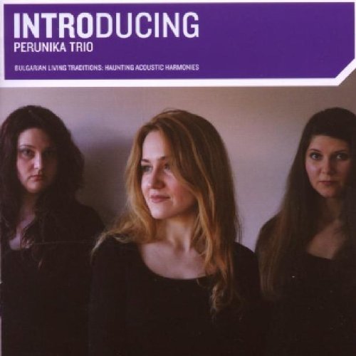 CD cover featuring three women with long hair and black tops, purple banner above.