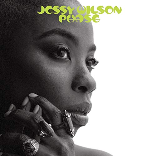 Black-and-white close-up of a woman's face with green text "Jessy Wilson Phase" above.