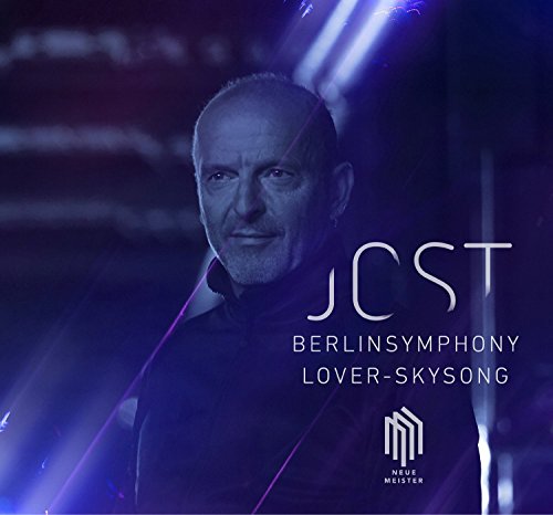 "CD cover with a man, blue lights, and white text."