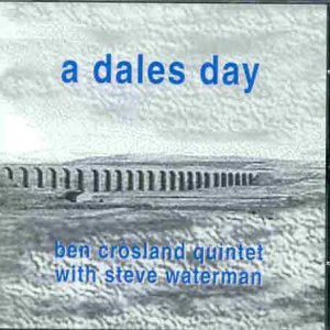 CD cover with blue text and a black-and-white landscape image.