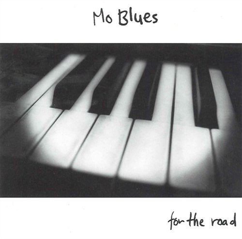 "CD cover with piano keys and text 'Mo Blues for the road'."