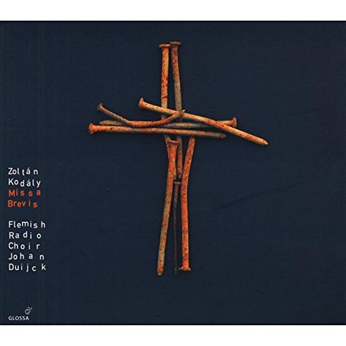 "CD cover with a rusty cross on a dark blue background, white and orange text."