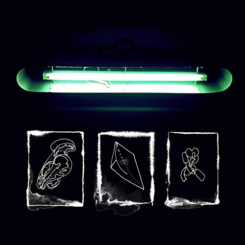 "Album cover with black background, glowing light, and three images: bird, kite, and ribbon."