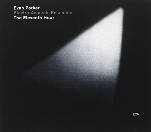 Dark blue album cover with white text and a white, triangular light beam.