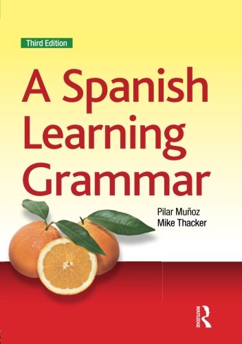 "A Spanish Learning Grammar" textbook cover with oranges and red, white, and yellow design.