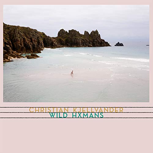 "Album cover with a person standing in shallow water, surrounded by rocky cliffs."