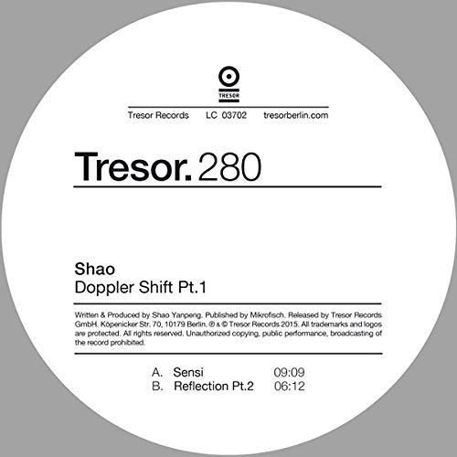 Vinyl record label with white center and black text on a gray background.