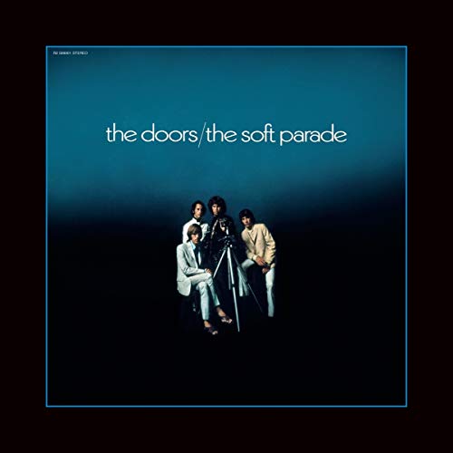 The Doors vinyl album cover, featuring the band members posed around a camera stand.