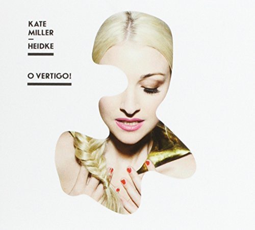 Album cover with a blonde woman and cut-out head shape on a white background.