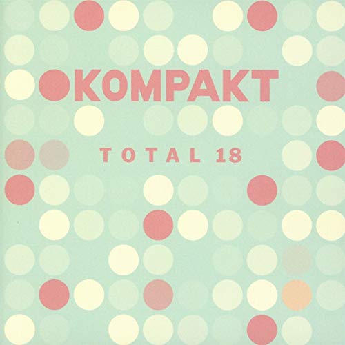 "Light blue album cover with pastel dots and 'KOMPAKT TOTAL 18' text."