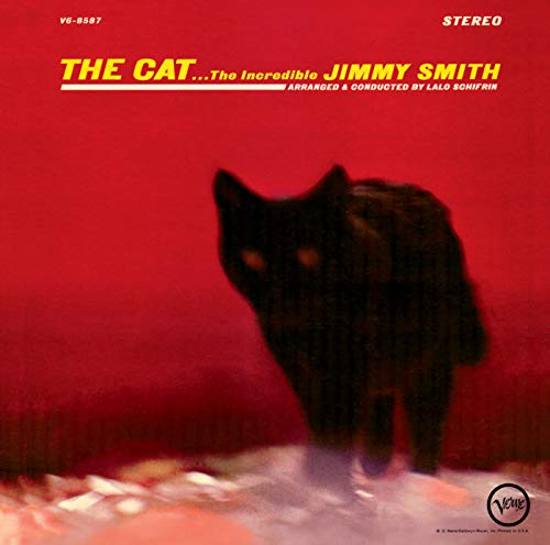 Red album cover with a black cat and yellow title text.