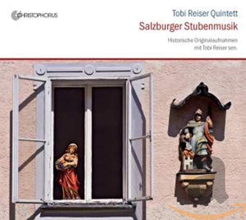 CD cover with religious statues on a building, white and pink design.