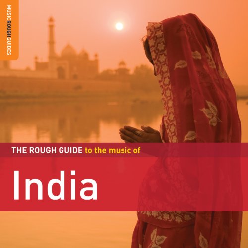 "CD cover with a woman in red sari, mosque in the background."