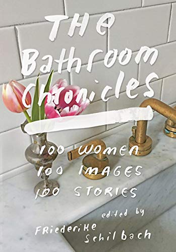 Book cover with a marble sink, brass faucet, and pink tulips in a vase.