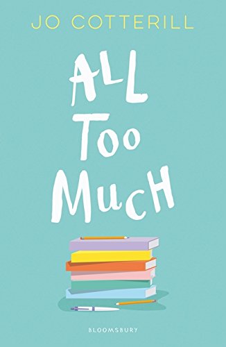 "Book cover with 'All Too Much' text, stacked books, and pens on a teal background."
