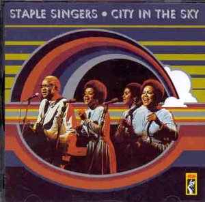 The Staple Singers album cover featuring a band portrait in a circular frame.