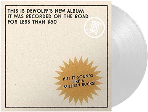 White vinyl record with beige cover featuring black text and a gold starburst.