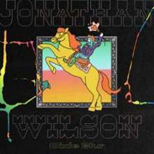 "Album cover with a yellow horse and rider on a black background."