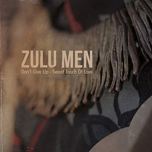 Vinyl record cover with "Zulu Men" text and hands adorned with fringed cuffs.