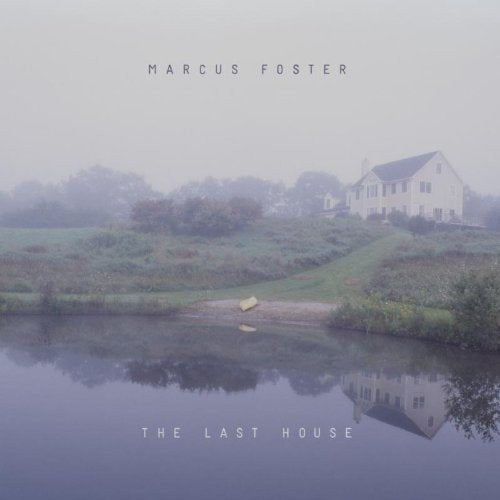 Album cover: foggy landscape with a house reflected in calm water, titled "The Last House".
