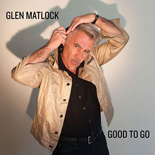"Album cover featuring Glen Matlock posing against a white wall with shadow."