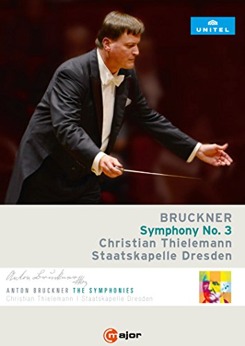 DVD cover featuring a conductor in a tuxedo holding a baton, blurred background.