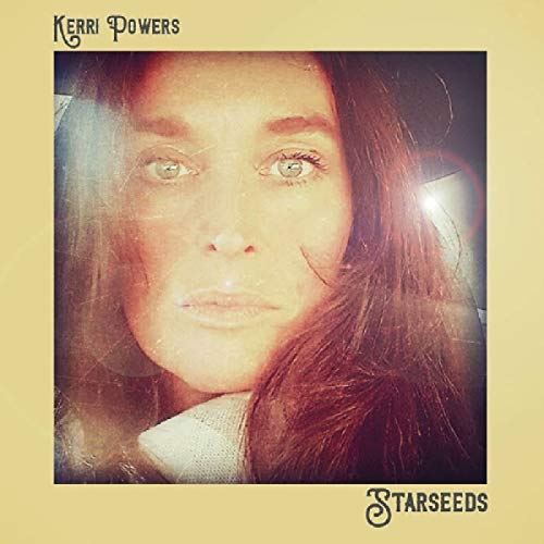 Album cover with a woman's face and long hair on a yellow background.