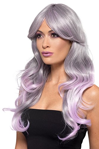 Woman wearing a long, wavy grey and pastel pink ombre wig.