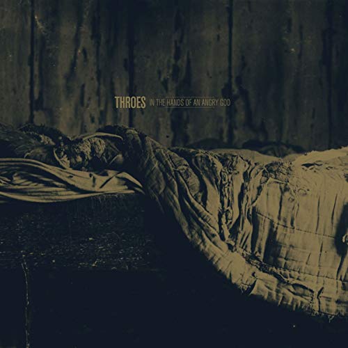 Dark vinyl record album cover with a person lying on a bed.