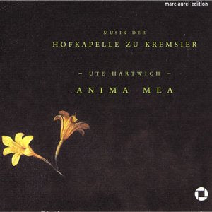 CD cover with yellow flower on black background, featuring yellow text and a small white logo.