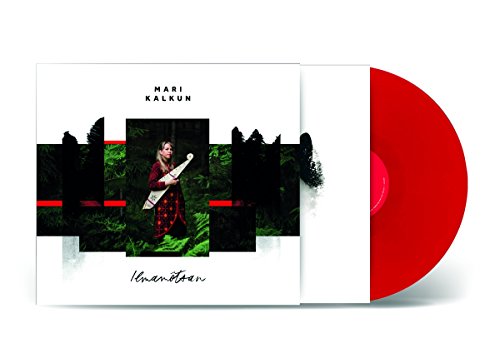 The image shows a woman holding a white instrument in a forest, surrounded by a red and black design. A concise alt text for this image could be: "Woman in red patterned coat holding a white instrument in a forest."