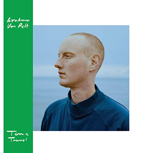 A man with a shaved head wearing a blue shirt, on a vinyl album cover.
